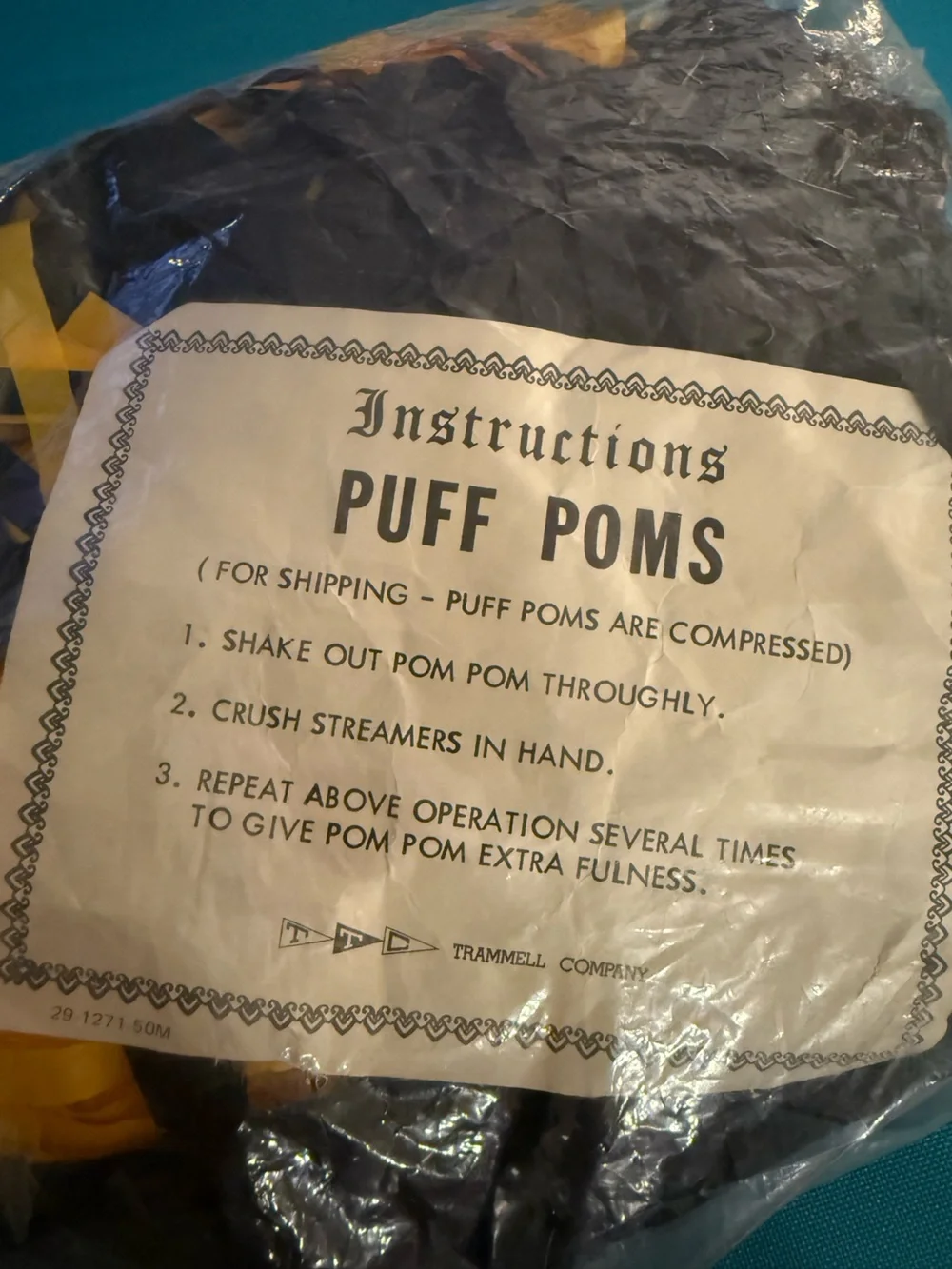 Vintage 70’s Pom-Poms  -  found stored at my moms. Black and gold (yellow)
